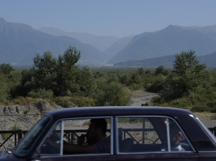 View up into the Greater Caucasus - and, oh, a Lada.